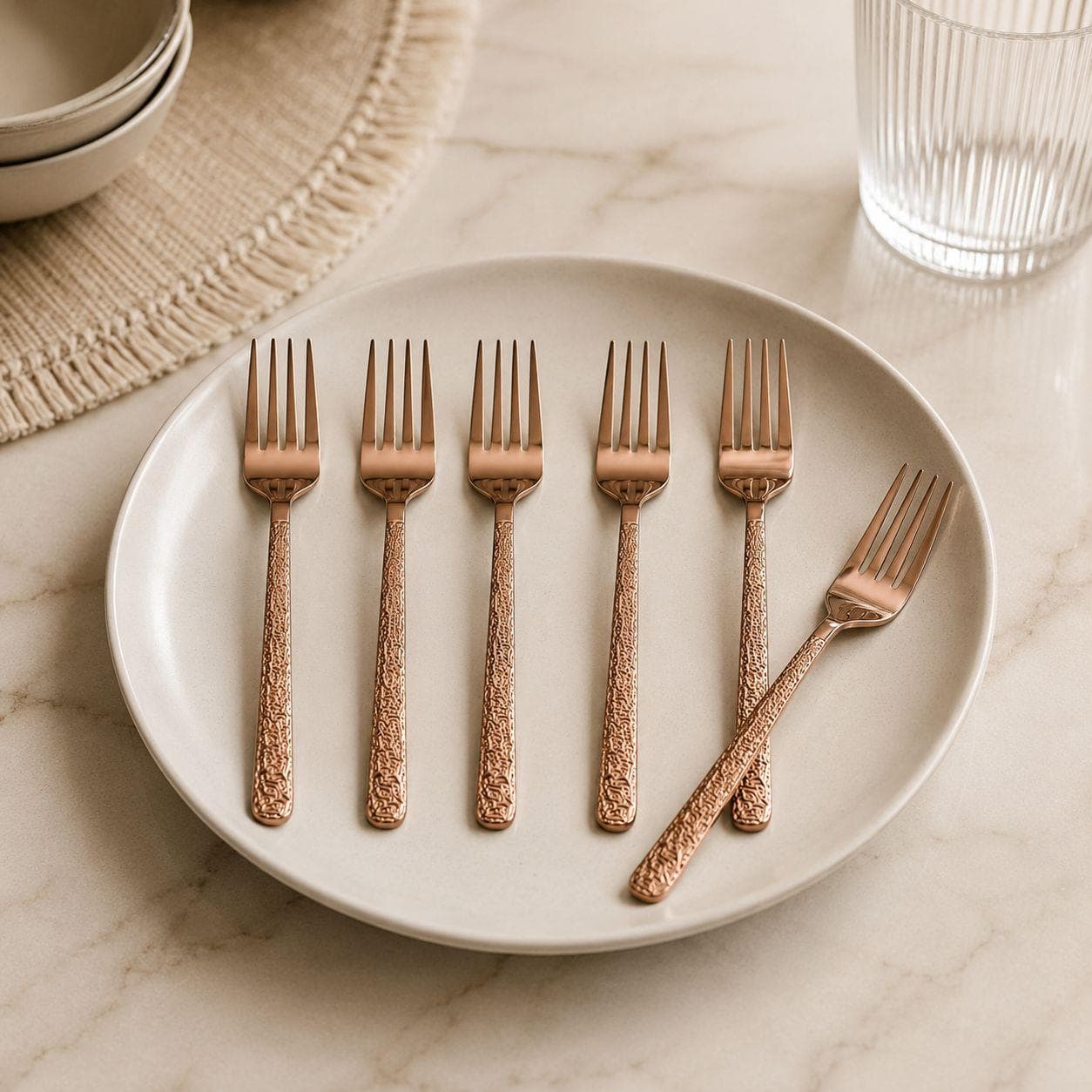 6-piece rose gold dessert fork set with an elegant design, perfect for serving sweets.