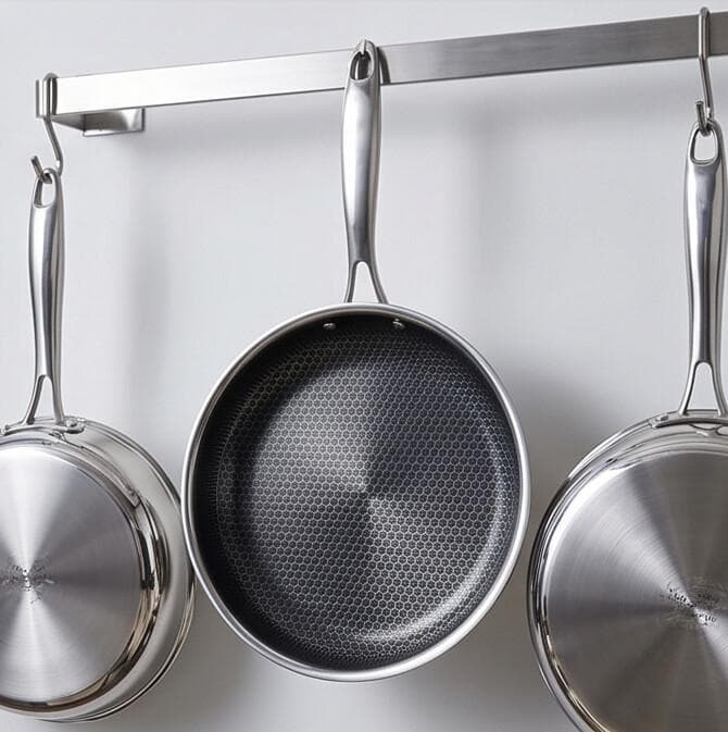 Stainless steel frying pan without lid, textured surface, Size  26 × 5 cm, ideal for quick frying.