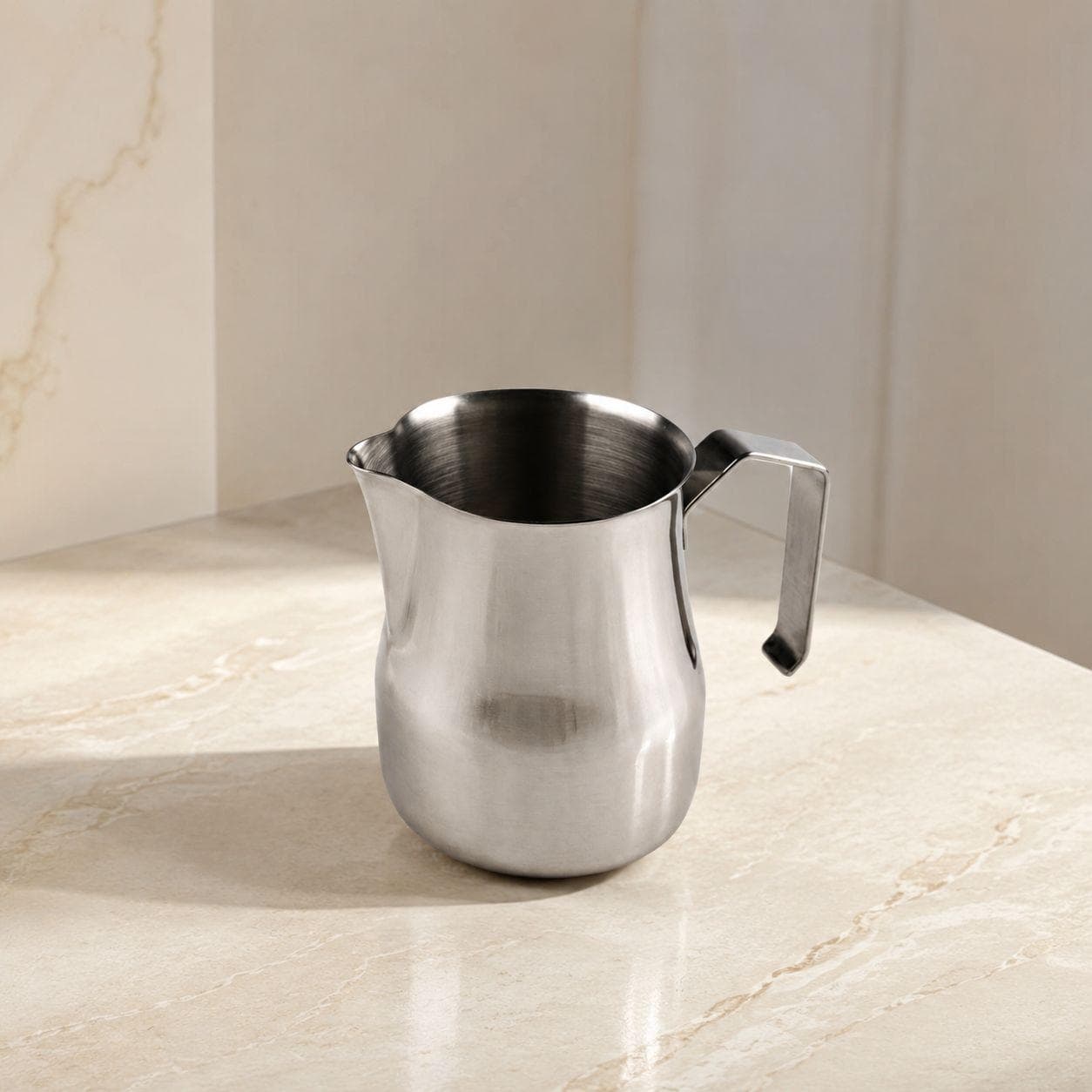 500ml stainless steel milk pot in natural finish, ideal for heating and easy pouring.