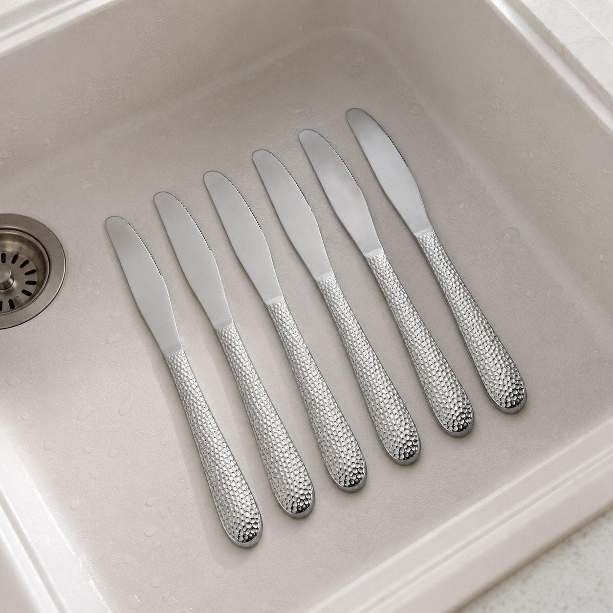 6-piece stainless steel dining knife set with a stylish hammered design, ideal for daily use and serving. 3