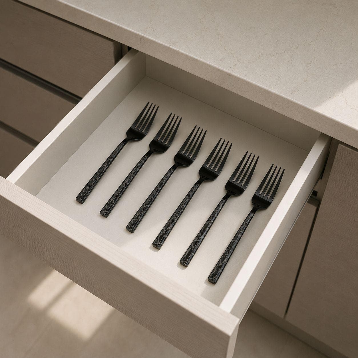 6 black titanium dining forks with laser pattern, suitable for serving food. 3