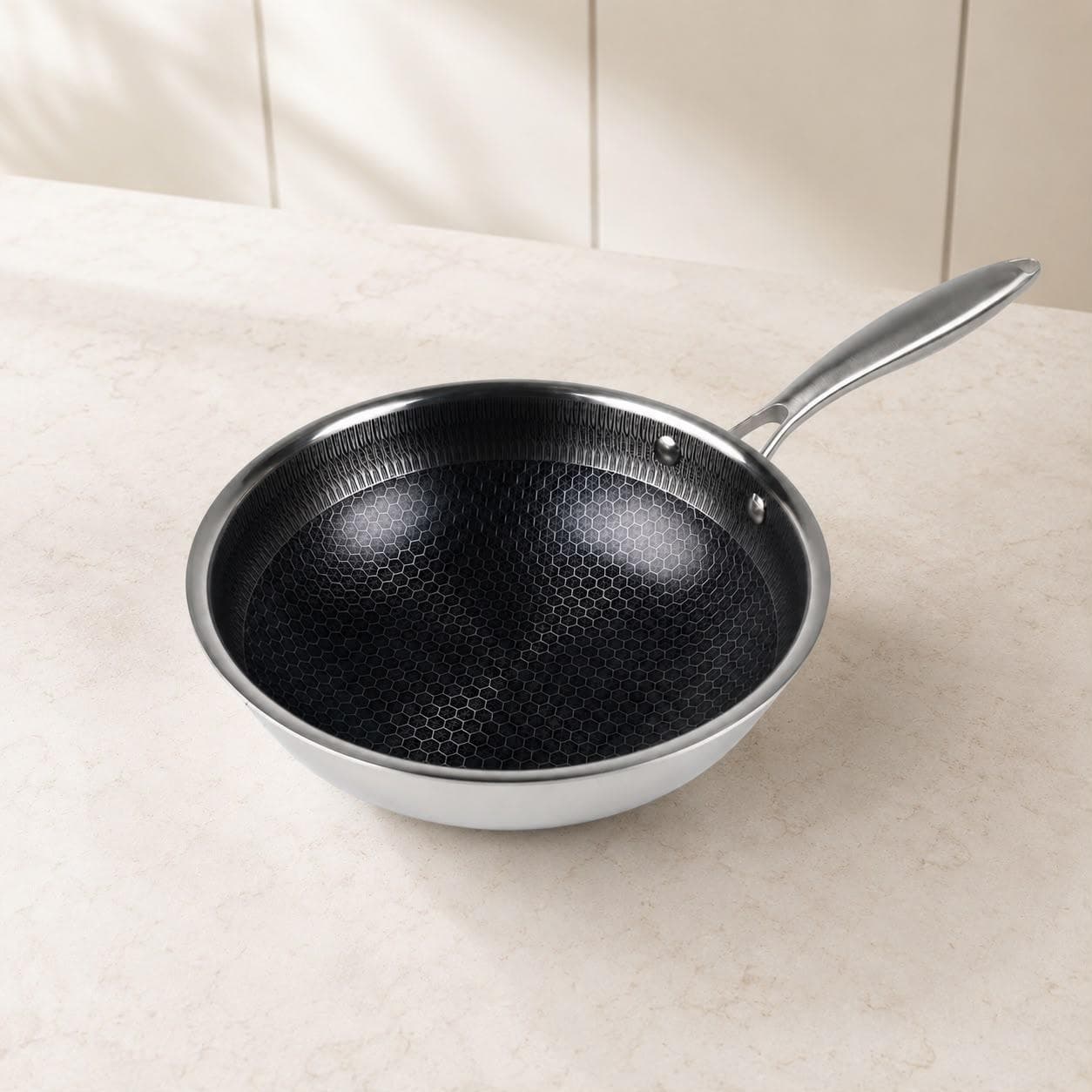 Tri-ply stainless steel pan without lid, Size 24 × 7.5 cm, suitable for frying and cooking.