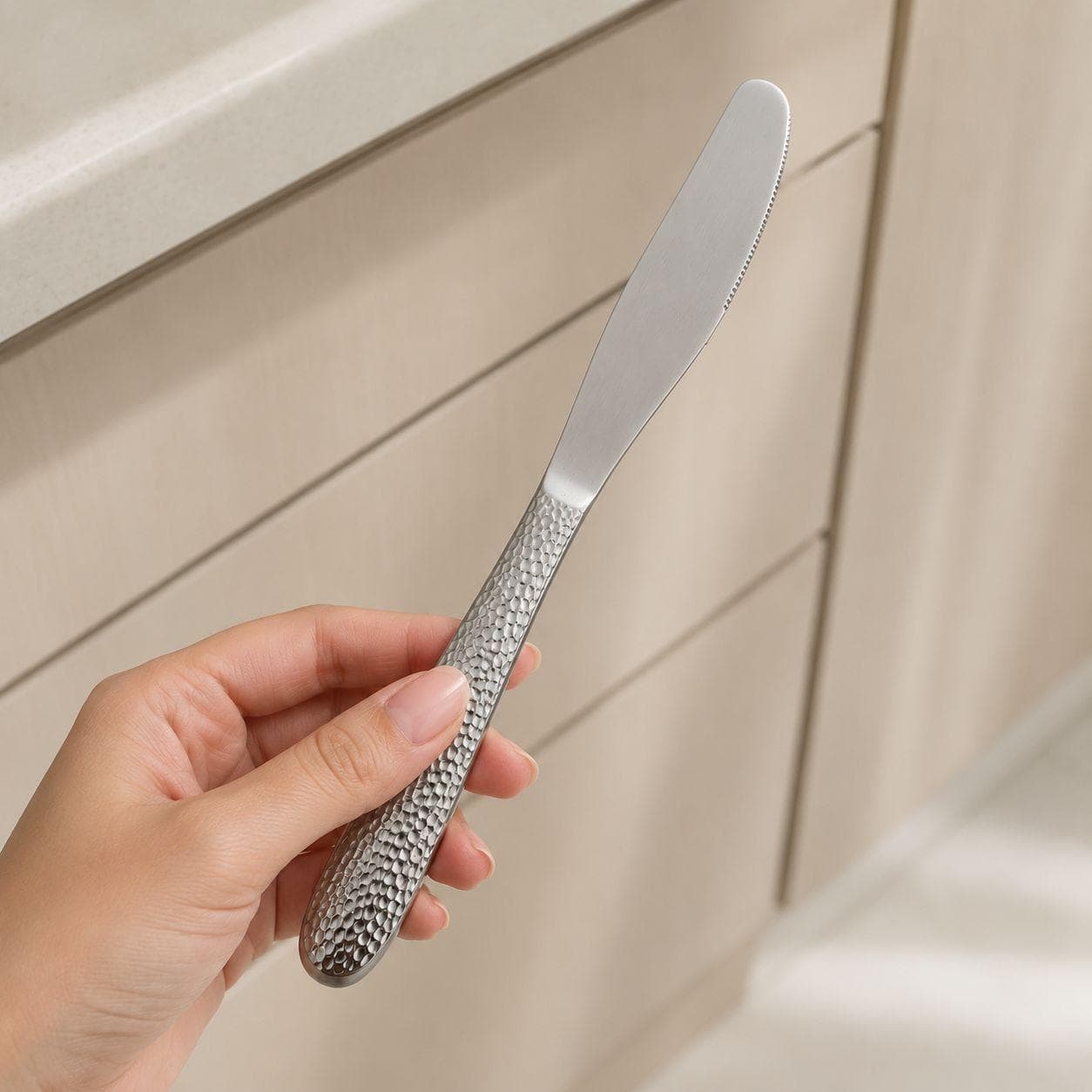 6-piece stainless steel dining knife set with a stylish hammered design, ideal for daily use and serving.